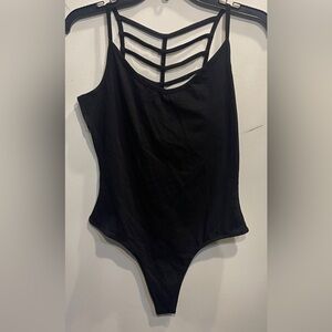 Black Cotton Blend, fun one piece to wear under shorts or jeans.